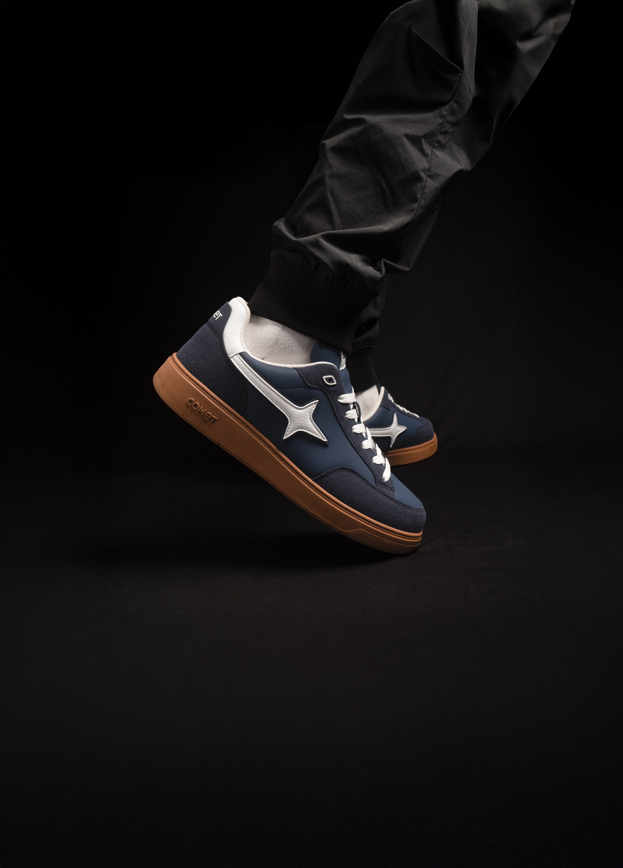 Person wearing Comet shoes on feet