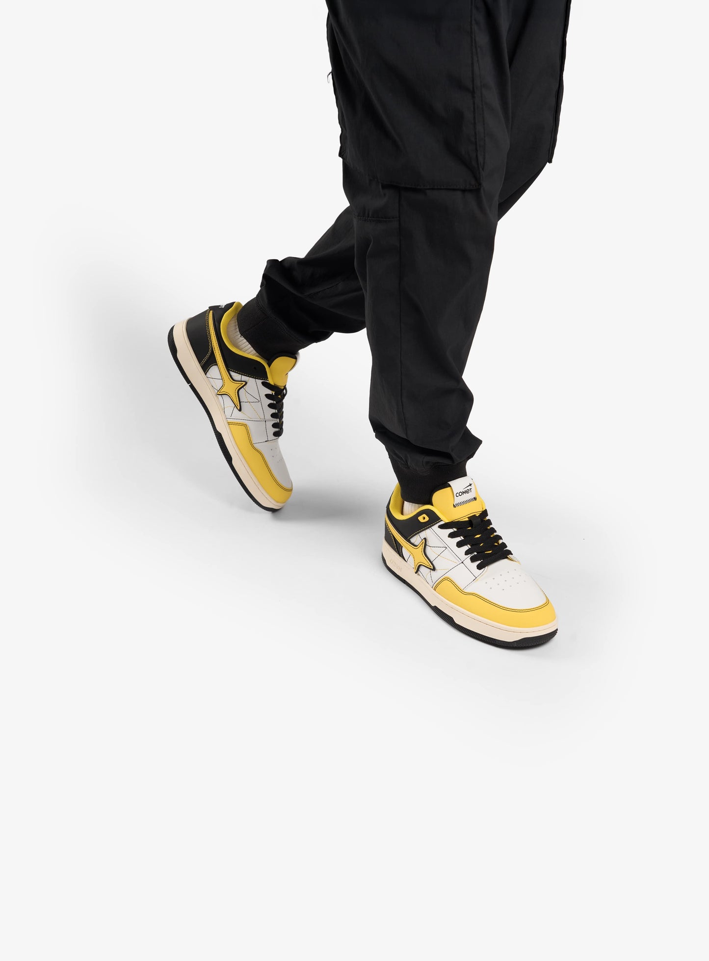 Person wearing Comet shoes on feet