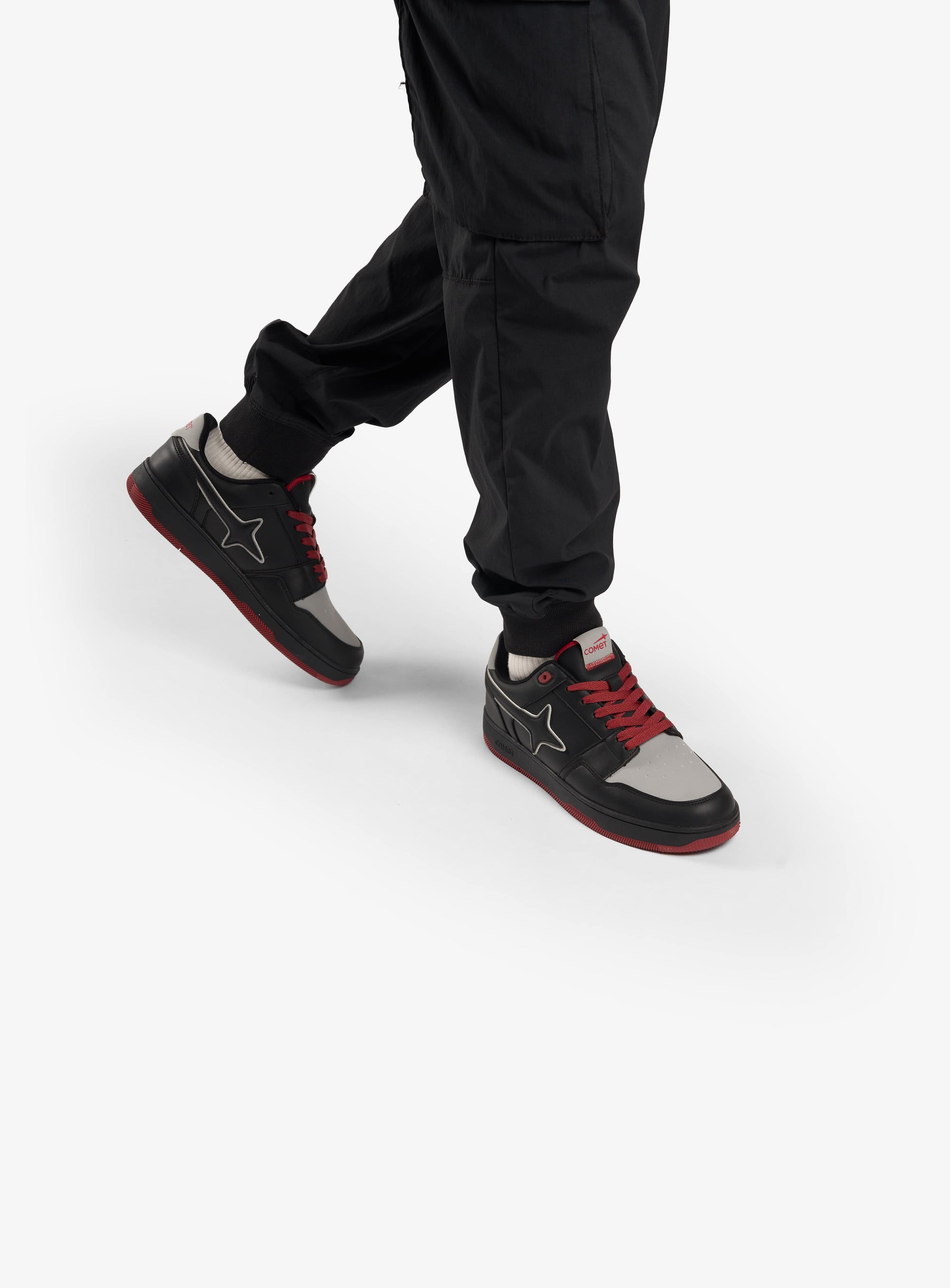 Person wearing Comet shoes on feet